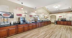 a large room with a counter in a store at Best Western Plus Heritage Inn in Stockton