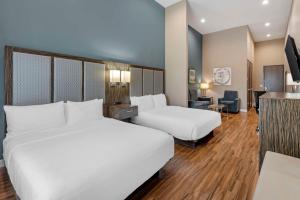Postel nebo postele na pokoji v ubytování Best Western Plus Pflugerville Inn & Suites