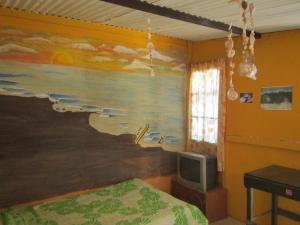 TV/trung tâm giải trí tại Casa De Darwin