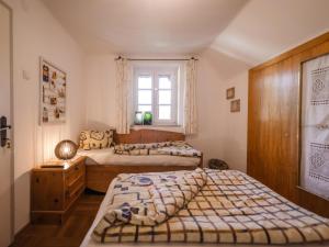 Postel nebo postele na pokoji v ubytování Naturpark Chalet Schladming-Dachstein