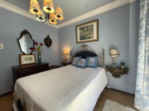 Ένα ή περισσότερα κρεβάτια σε δωμάτιο στο Casa da Serra - Gerês +31 φωτογραφίες