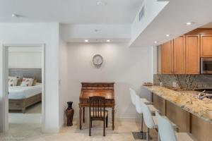 A kitchen or kitchenette at Modern 2 BDR at King David with Ocean View