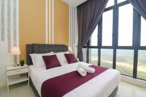 Postel nebo postele na pokoji v ubytování D'Pristine Medini Johor Bahru