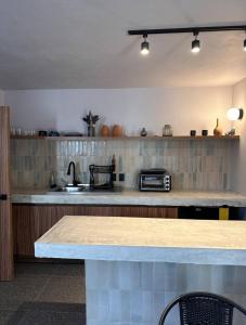 Kuchyň nebo kuchyňský kout v ubytování Casa Tonalli