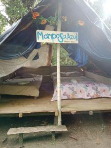 Cama o camas de una habitación en Eco Hospedaje Ata Ladrilleros