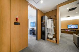 TV a/nebo společenská místnost v ubytování Haeundae The Van Hotel