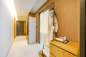 Postel nebo postele na pokoji v ubytování Haeundae The Van Hotel