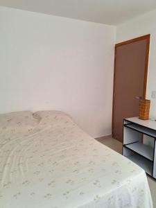 En eller flere senge i et værelse på Apartamento em Campina Grande