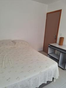 En eller flere senge i et værelse på Apartamento em Campina Grande