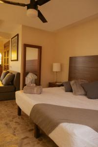 Postel nebo postele na pokoji v ubytování Suite elegante en la ciudad - Marques Suites