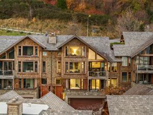 an aerial view of a log home at Karamata by MajorDomo in Queenstown +16 photos