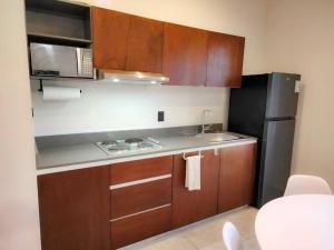 Imagen de la galería de Hobie Suite 1 Bed, Starlink WiFi, Balcony & Pool, en Bacalar