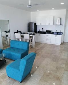 Dapur atau dapur kecil di Mahaguay - Bello departamento 2 recamaras en Mahahual