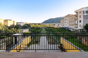 a view of a city from a balcony at Veranda sul Verde in Ficarazzi