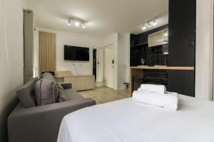 Et tv og/eller underholdning på MB611 - Apto aconchegante na Liberdade c/piscina