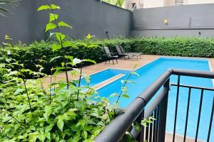 Swimmingpoolen hos eller tæt på MB611 - Apto aconchegante na Liberdade c/piscina