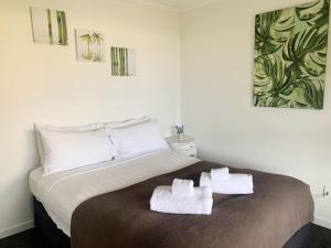 En eller flere senge i et værelse på Lakehouse at Panners