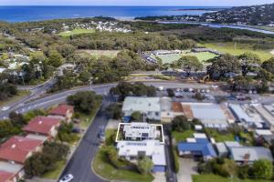 an aerial view of a suburb with houses and a road at Mysa Anglesea Sleeps 7 WiFi SmartTV Cafes Shops in Anglesea