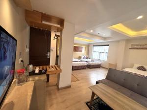 Rúm í herbergi á ViaVia Boutique Hotel - Kathmandu