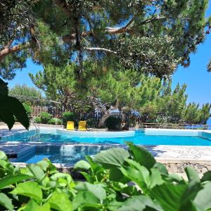 Bazén v ubytovaní Ferma Solaris Apartments alebo v jeho blízkosti