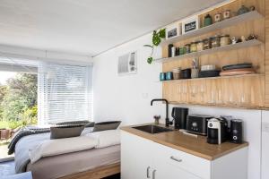 Η κουζίνα ή μικρή κουζίνα στο Mia Mia House +3 φωτογραφίες