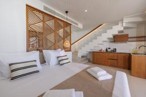 Kuchyň nebo kuchyňský kout v ubytování Deos Luxury Suites - Adults Only
