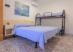 Postel nebo postele na pokoji v ubytování Casa verde