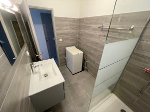 Koupelna v ubytování Corsicadream Barbicaja, superbe appartement dans villa, vue panoramique mer, piscine, proche Porticcio