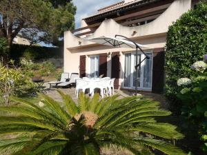 Zahrada ubytování Corsicadream Barbicaja, superbe appartement dans villa, vue panoramique mer, piscine, proche Porticcio