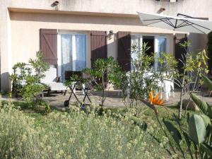 Zahrada ubytování Corsicadream Barbicaja, superbe appartement dans villa, vue panoramique mer, piscine, proche Porticcio