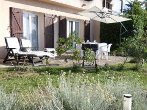 Zahrada ubytování Corsicadream Barbicaja, superbe appartement dans villa, vue panoramique mer, piscine, proche Porticcio