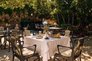 Сад в Arbiana Heritage Hotel +37 фотографий