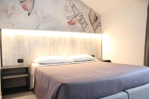 Voodi või voodid majutusasutuse Hotel Paradiso toas