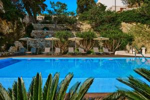 Бассейн в Arbiana Heritage Hotel или поблизости