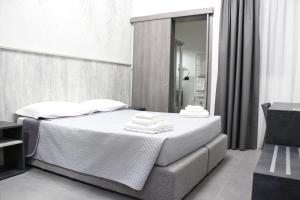 Voodi või voodid majutusasutuse Hotel Paradiso toas