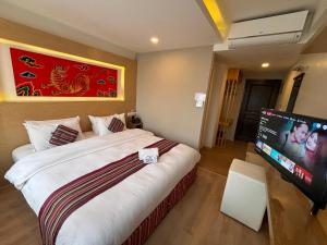 Rúm í herbergi á ViaVia Boutique Hotel - Kathmandu