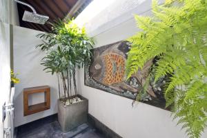 Ein Garten an der Unterkunft Seminyak Villa