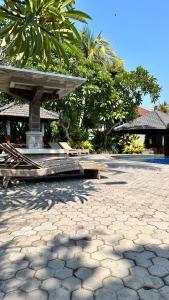 Swimmingpoolen hos eller tæt på Puri Bali Hotel