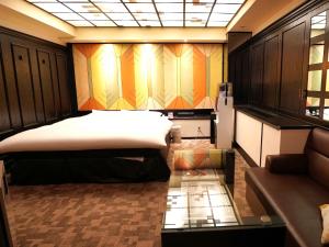 Letto o letti in una camera di ホテルロイヤルトン