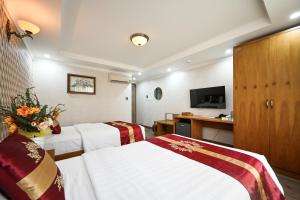 TV a/nebo společenská místnost v ubytování The River Park Hotel