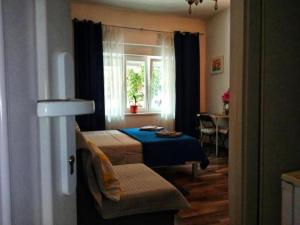 Postel nebo postele na pokoji v ubytování Lucky Rooms