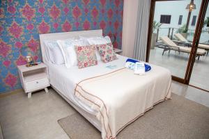 Een bed of bedden in een kamer bij Dos Lunas Aparthotel