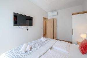 Posteľ alebo postele v izbe v ubytovaní MyFlat Casa Luxury Apartment