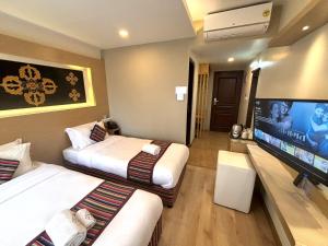 Sjónvarps- og/eða afþreyingartæki á ViaVia Boutique Hotel - Kathmandu