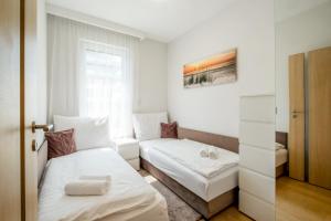 Posteľ alebo postele v izbe v ubytovaní MyFlat Casa Luxury Apartment