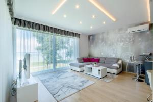 Posedenie v ubytovaní MyFlat Casa Luxury Apartment