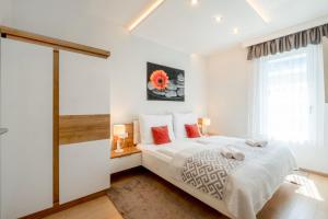 Posteľ alebo postele v izbe v ubytovaní MyFlat Casa Luxury Apartment