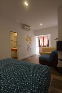 Posteľ alebo postele v izbe v ubytovaní Hostal Casa Arco Iris (Playa)