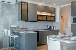 Kuchyňa alebo kuchynka v ubytovaní MyFlat Casa Luxury Apartment