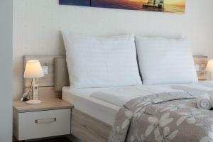 Posteľ alebo postele v izbe v ubytovaní MyFlat Casa Luxury Apartment